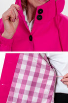 Barbara Pink Raincoat featuring vibrant pink windbreaker jacket with black buttons and pink checkered inner lining