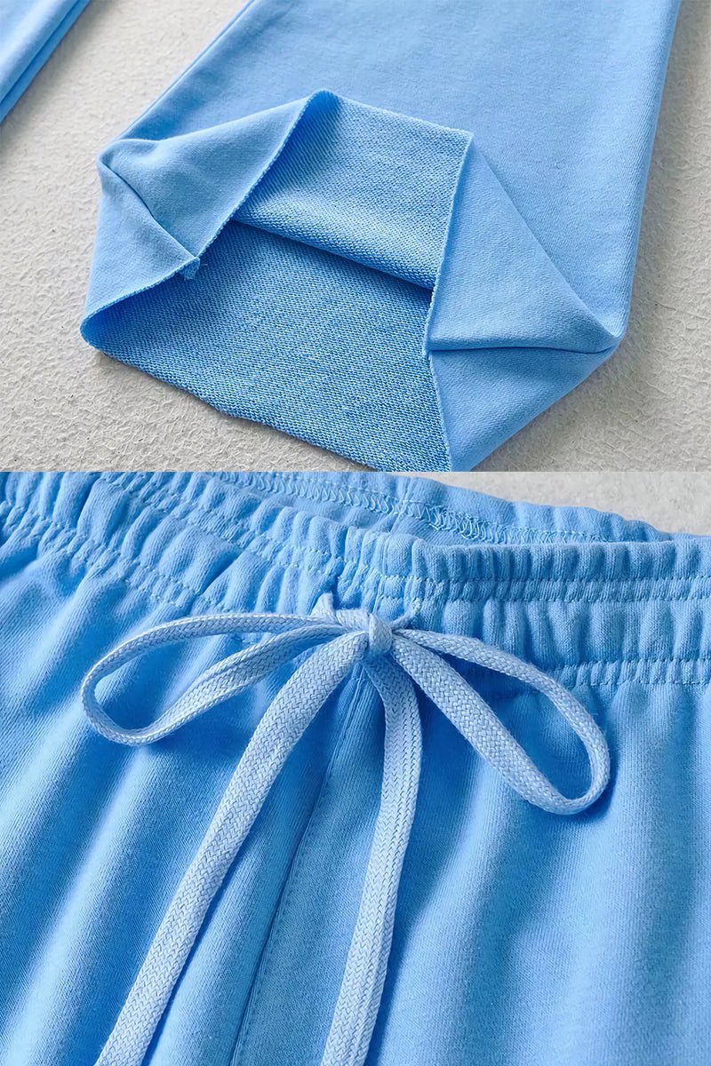 Light blue comfy wide-leg pants with elastic waistband and drawstring closure made from breathable sustainable fabric