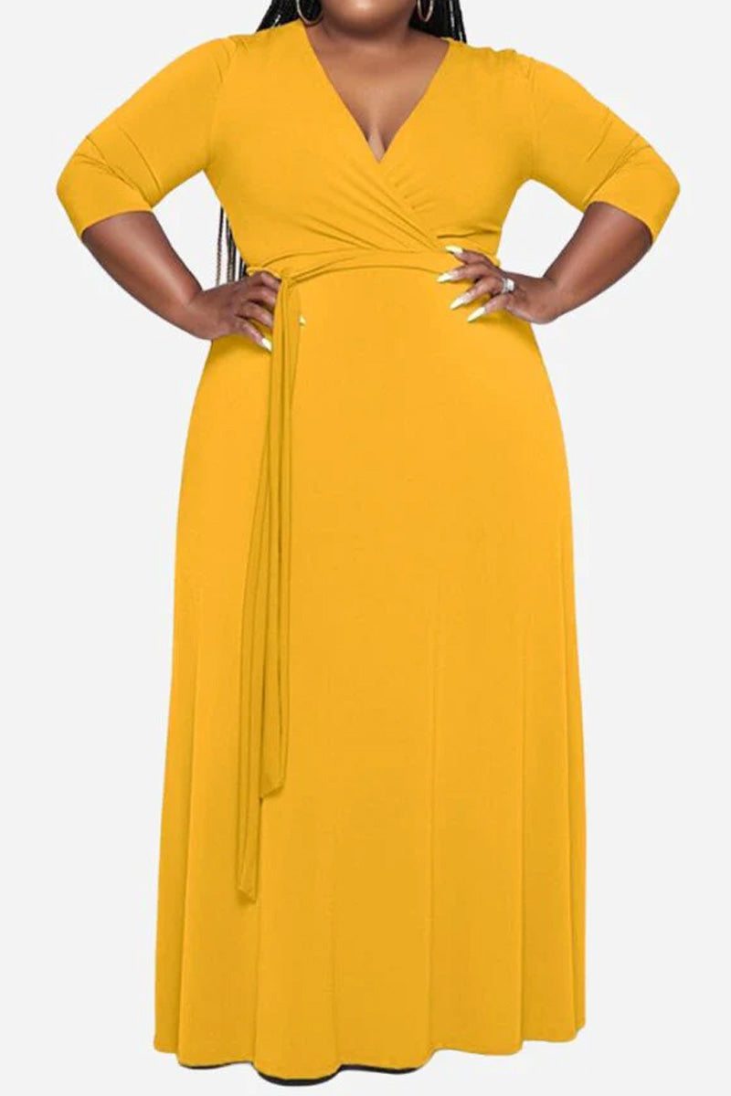 Elegant plus size dress with belt, deep V-neck, 3/4 sleeves, swing skirt, yellow color.