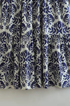 Close-up of blue floral pattern on fabric of Blue Floral Lantern Sleeves Midi Dress made of 100% polyester