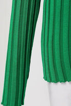 Close-up of green ribbed knit sleeve from Timeless Striped Two-Piece knitwear set