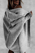Gray warm oversized hooded cardigan with relaxed fit and cozy knit fabric worn off-shoulder