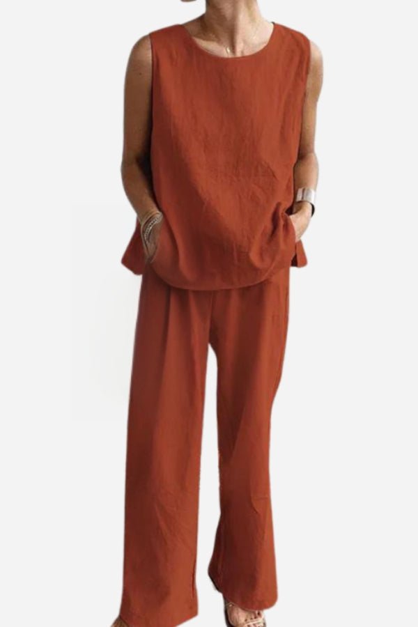 woman wearing loose solid color sleeveless two-piece set in rust orange