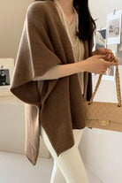 Relaxed flowy open front knitwear cardigan in brown with soft drape and cozy lightweight fabric.