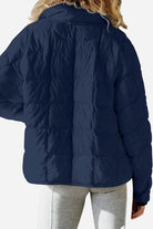 Lightweight puffer travel jacket packed compactly for travel with versatile style and featherlight warmth