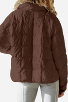 Lightweight puffer travel jacket compressible packable versatile warm eco-friendly design
