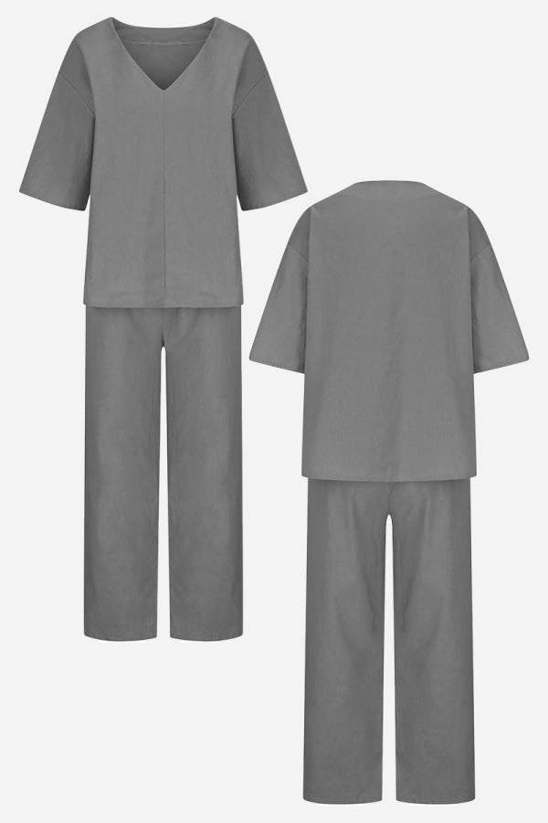 Grey V-neck cotton two-piece trouser set with mid-length sleeves and straight-leg pants, front and back views.