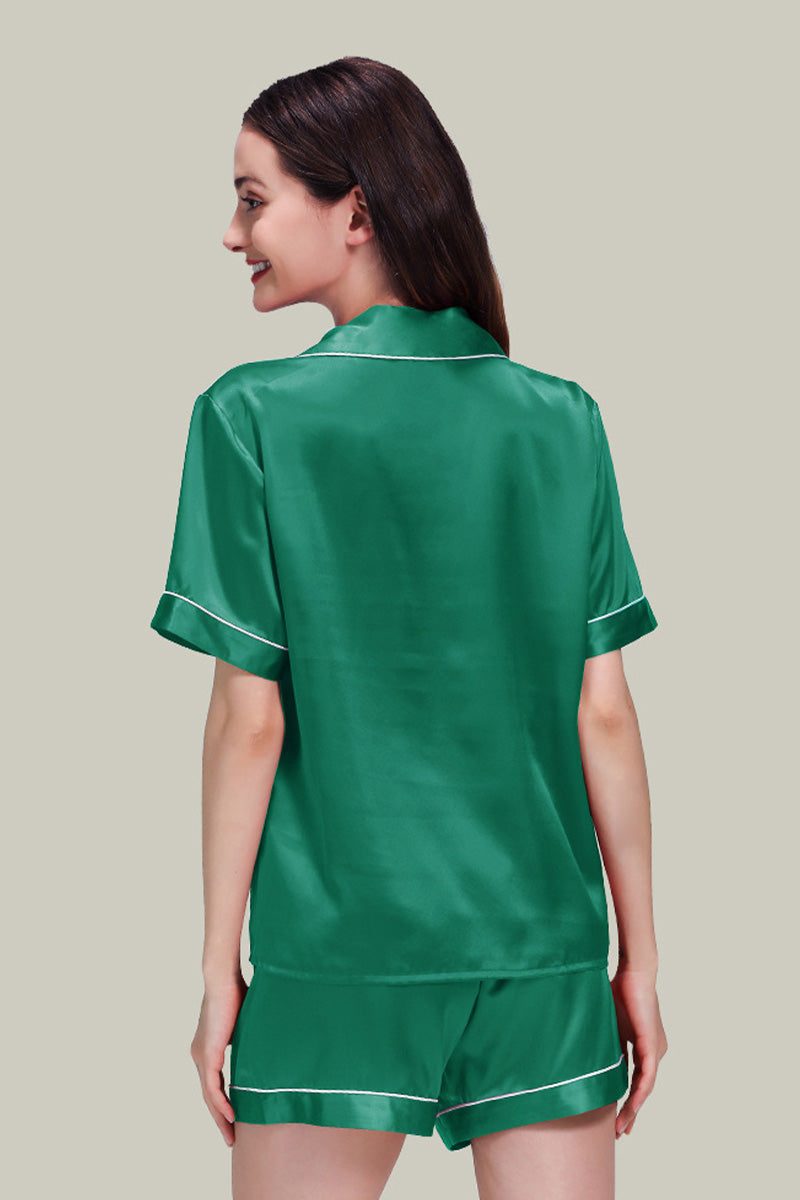 Back view of woman wearing green Mulberry Silk buttoned short set nightwear with short sleeves and shorts