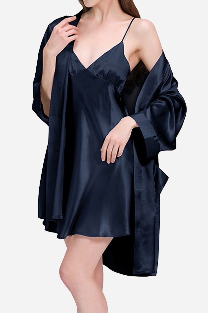 Woman wearing a black Mulberry Silk Nighty and robe set with a relaxed, oversized fit.