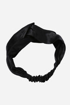 Black silk hairband made from 100% premium silk, lightweight and gentle on hair to prevent breakage and frizz.