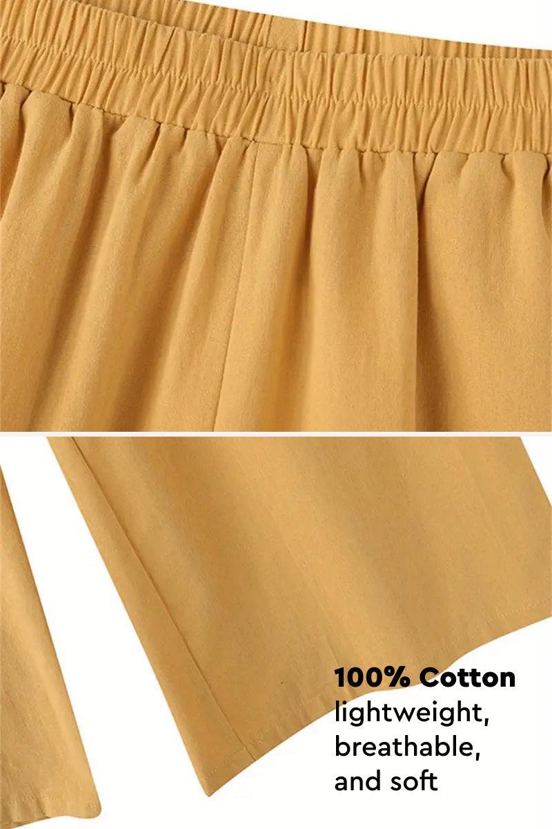 Close-up of mustard yellow cotton casual solid pants with elastic waistband and breathable lightweight fabric