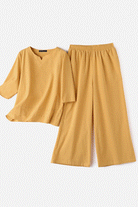 Cotton casual solid color relaxed fit pants set in mustard yellow breathable fabric