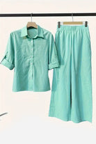 Light green cotton blend two-piece set with long-sleeve button-up shirt and wide-leg pants