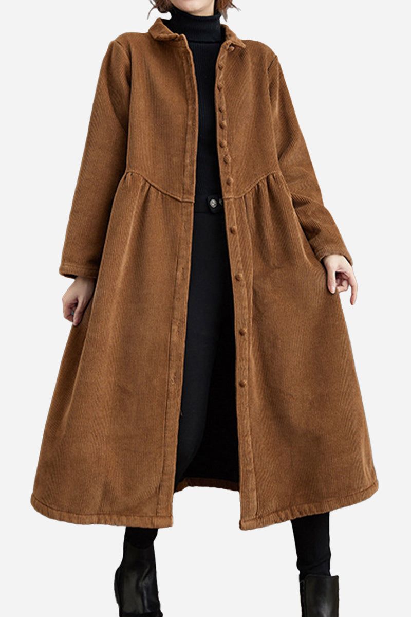 Oversized vintage corduroy coat in warm brown with classic button front and long sleeves.