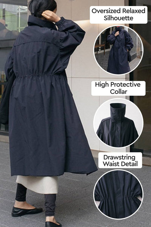 Oversized cotton blend stain-resistant coat with relaxed silhouette, high protective collar, and adjustable drawstring waist detail