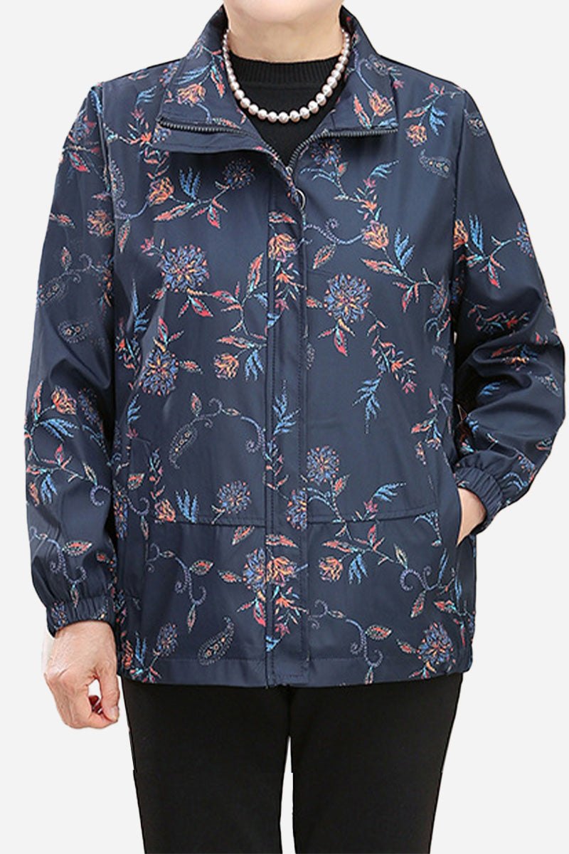 Plus size weathershield floral jacket with water-resistant and windproof fabric designed for comfort and travel.
