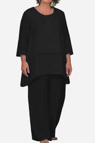 Black loose drape two-piece set with oversized top and wide-leg pants, breathable polyester-spandex blend for stylish comfort.