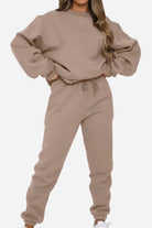 Classic Comfort Athleisure set in soft beige with relaxed fit sweatshirt and matching jogger pants.
