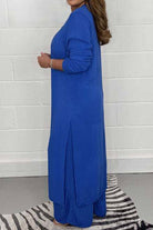 Woman wearing cobalt blue Urban Chic V-Neck Split Top two-piece set with long sleeves and flowing split sides.