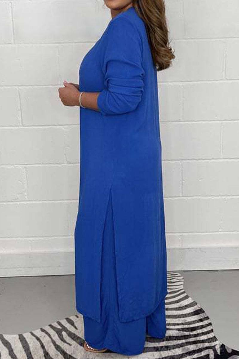 Woman wearing cobalt blue Urban Chic V-Neck Split Top two-piece set with long sleeves and flowing split sides.