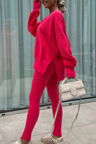 Woman wearing bright pink TimelessChic Ultra Comfortable Two-Piece Set with loose top and fitted leggings outdoors