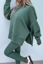 Woman wearing TimelessChic Ultra Comfortable Two-Piece Set in green, featuring a relaxed top and high-waisted leggings.