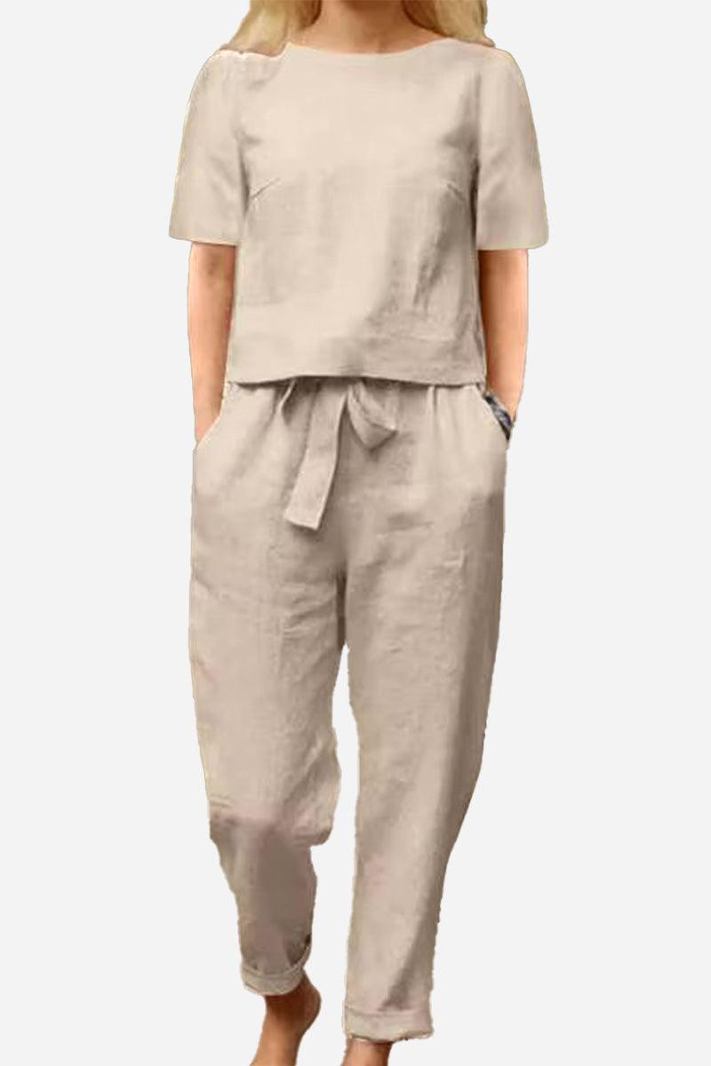 Beige cotton-linen blend two-piece set with short-sleeve top and relaxed pants, breathable and lightweight outfit for casual wear.