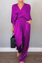 Purple satin wrap lounge two-piece set with relaxed fit and V-neck top