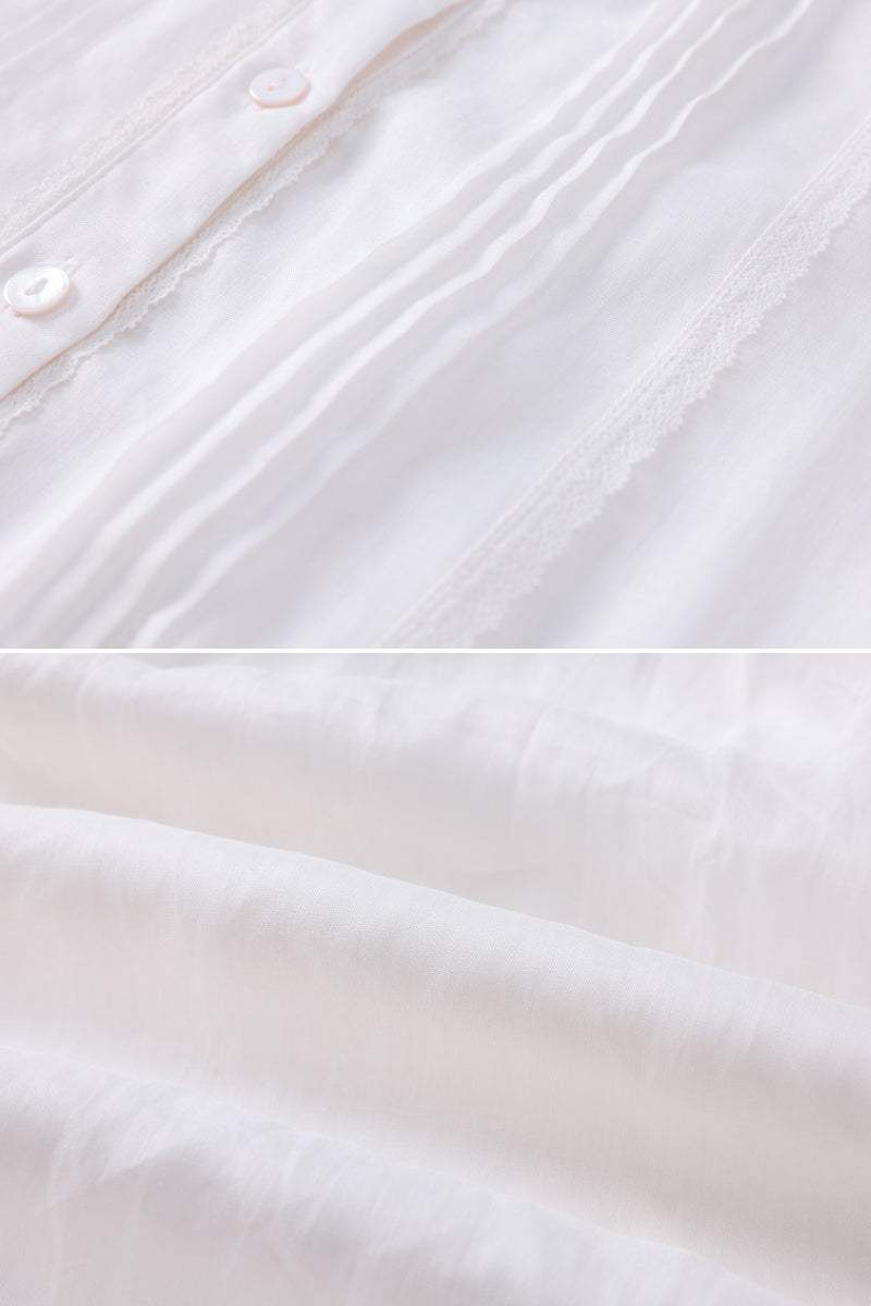 close-up of white 100% linen fabric with button and pleated details for coastal shift dress
