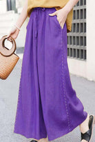 100% linen wide-leg purple pants with elastic waist and relaxed fit for all-day comfort