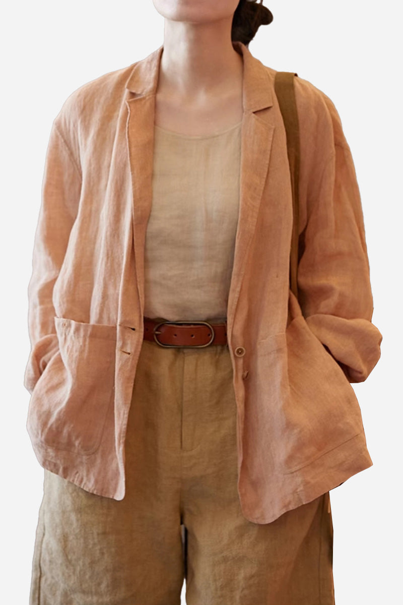 Peach 100% linen jacket shirt with notched lapel collar and functional pockets, worn layered over beige linen top and pants, breathable lightweight fabric.
