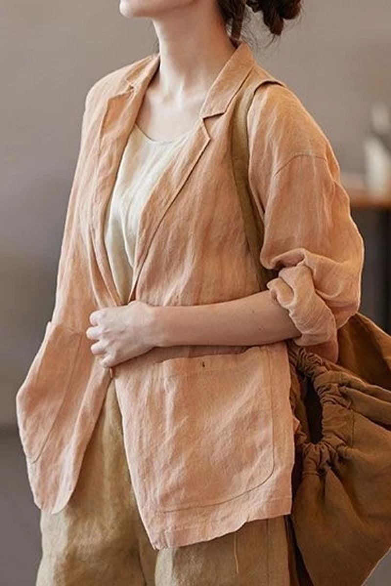 Women's peach linen jacket shirt with notched lapel collar and functional pockets, perfect lightweight layering piece.