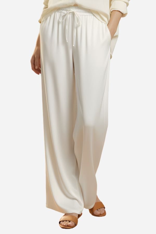 White Subtle Moves Silk Wide Leg Trousers with high waist and relaxed fit for breathable comfort and elegant drape