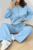 The Voyager Zip Set light blue zip-front sweatshirt and wide-leg joggers travel outfit