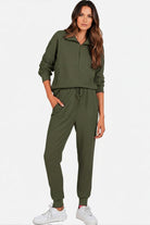 Unisex half-zip pullover and sweatpants set in olive green with casual relaxed fit and lightweight polyester blend