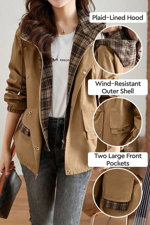 Women wearing brown City Explorer Plaid Windbreaker with plaid-lined hood, wind-resistant shell, and two large front pockets.