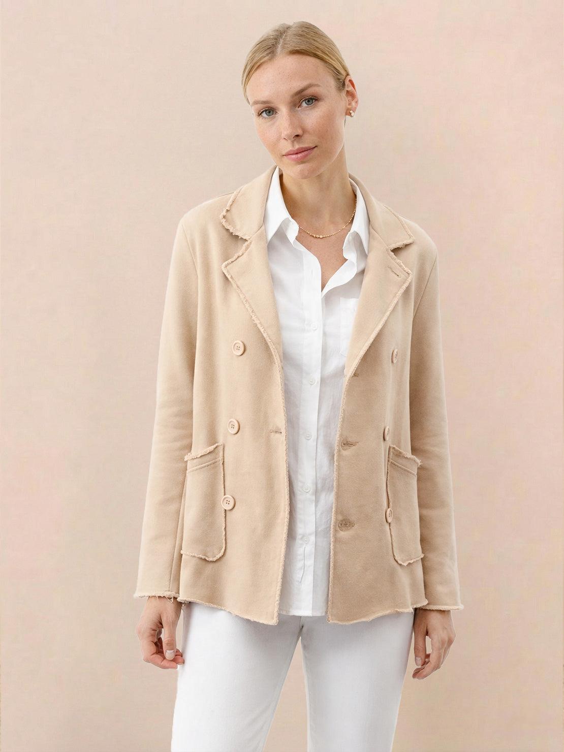 Modern classic double-breasted blazer with raw-edge seaming and cotton-blend fabric for structured comfort