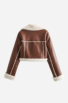 Brown cropped faux leather sherpa jacket with cream fleece lining and trim, zip front closure.