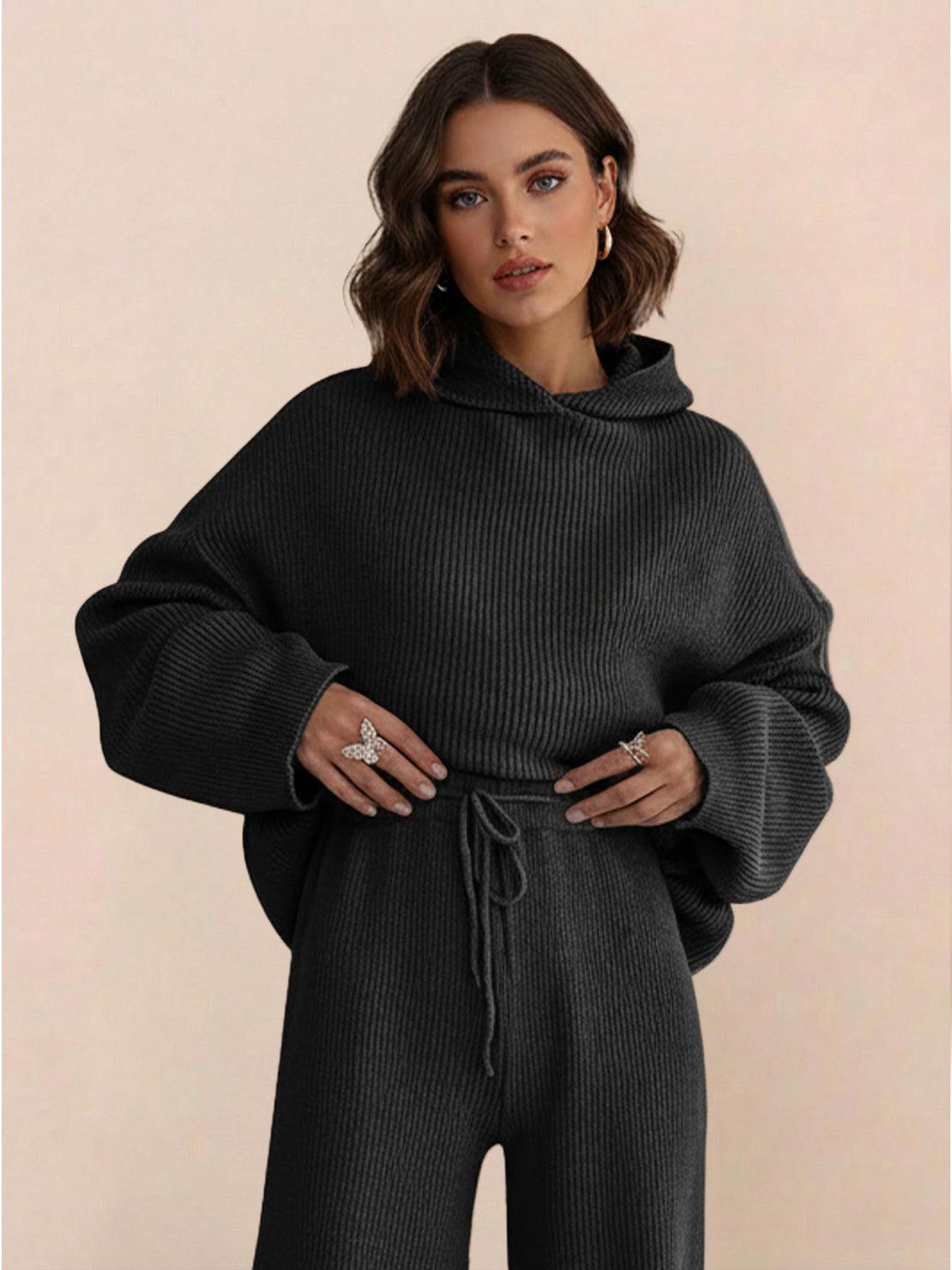 woman wearing black waffle-knit two-piece hoodie and pants set