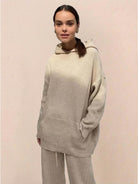 womens waffle-knit two-piece hoodie and pants loungewear set in neutral tone with relaxed fit and soft ribbed texture