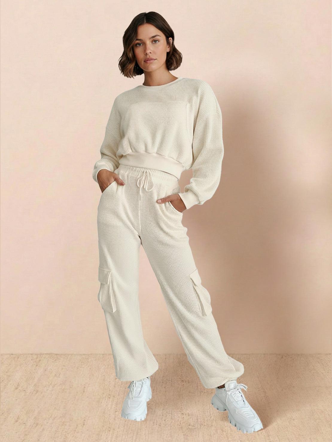 woman wearing breathable 100% cotton waffle knit set with sweatshirt and cargo pants in cream color