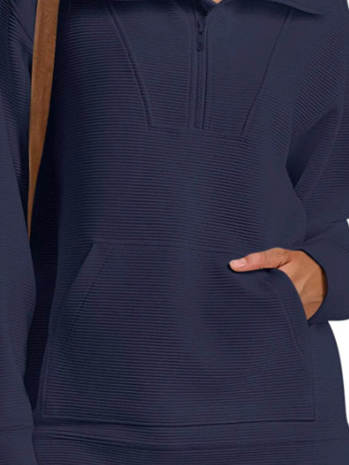 Half-zip waffle pullover in neutral tone with kangaroo pocket and fold-over collar