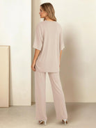 Oversized long-line loungewear set with pullover and wide-leg pants in soft knit fabric