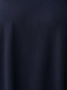 Oversized long-line loungewear set with short-sleeve pullover and wide-leg pants in soft knit fabric