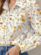 floral button-down shirt with long roll-up sleeves and hip-length hem
