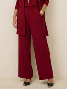Open-front three-piece co-ord with longline cardigan, tank top, and wide-leg trousers in lightweight knit fabric