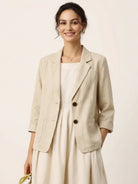 Cotton-linen blazer with notch lapels and two-button front in natural textured fabric