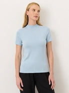 100% Merino Wool slim-fit short-sleeve mock neck tee in neutral color