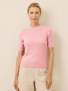 Slim-fit short-sleeve 100% Merino wool mock neck tee in neutral color