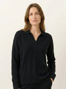 Oversized polo knit loungewear set with V-neck collar and straight-leg pants in soft knit fabric
